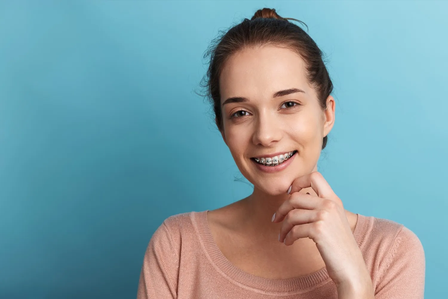 Confident smile with braces after orthodontic treatment at Agrim Dental Clinic Kathmandu